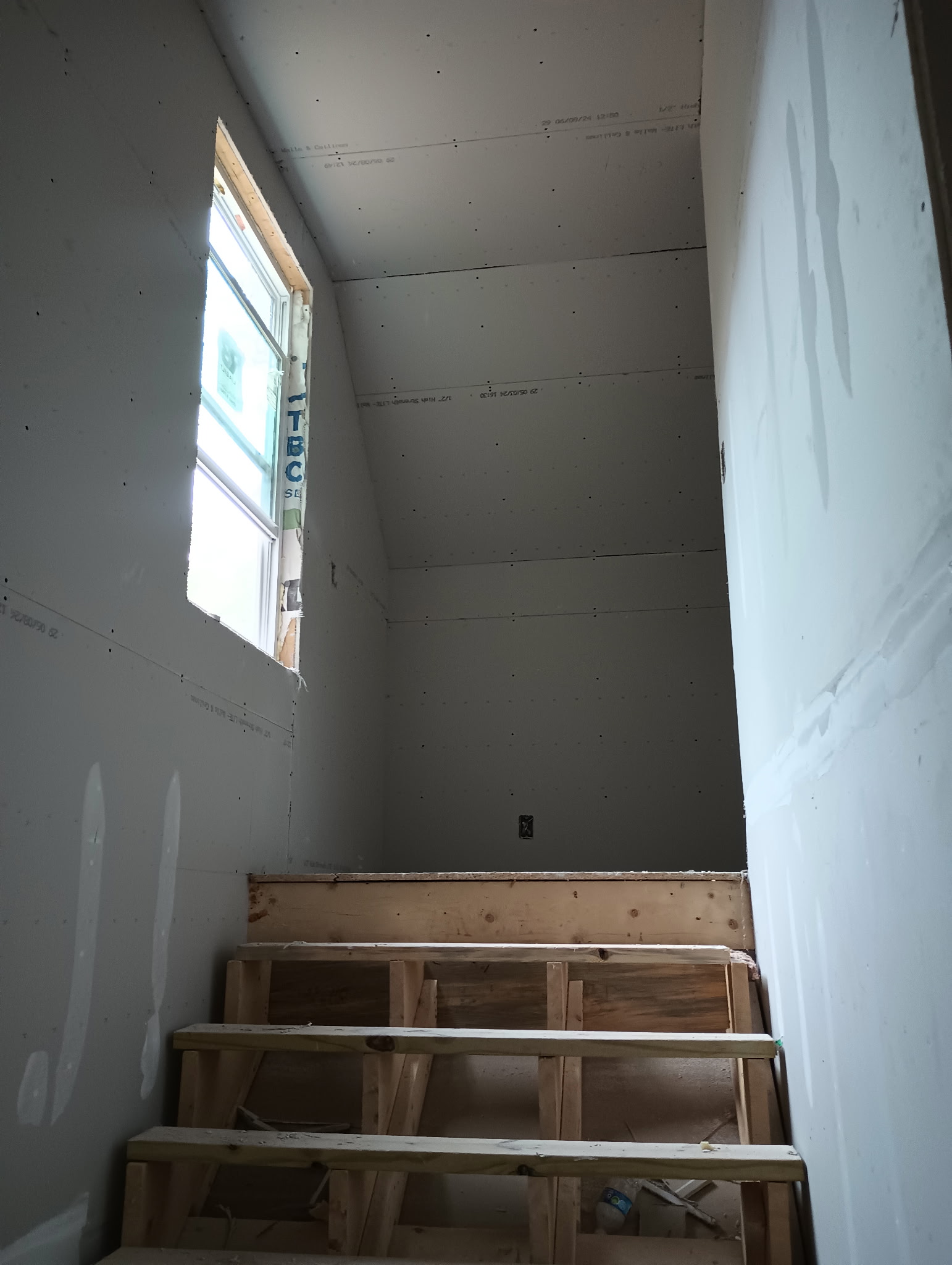 Stairwell drywall before finishing
