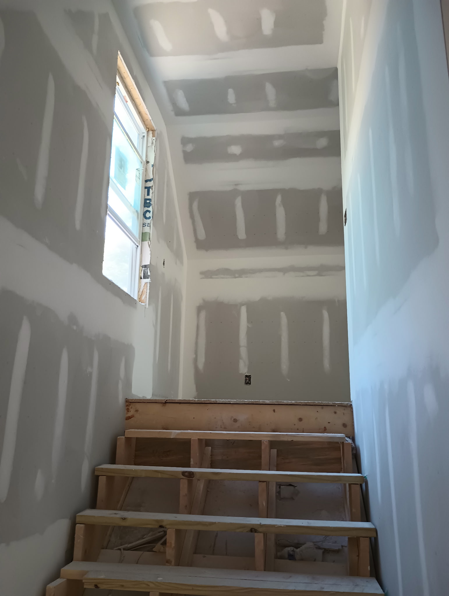 Stairwell drywall after finishing